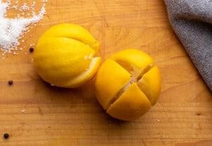 Cut lemons for preserving.